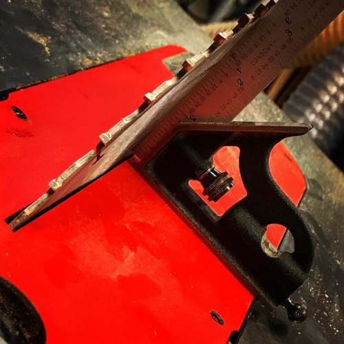 By using a Ruler or another Straight Edge