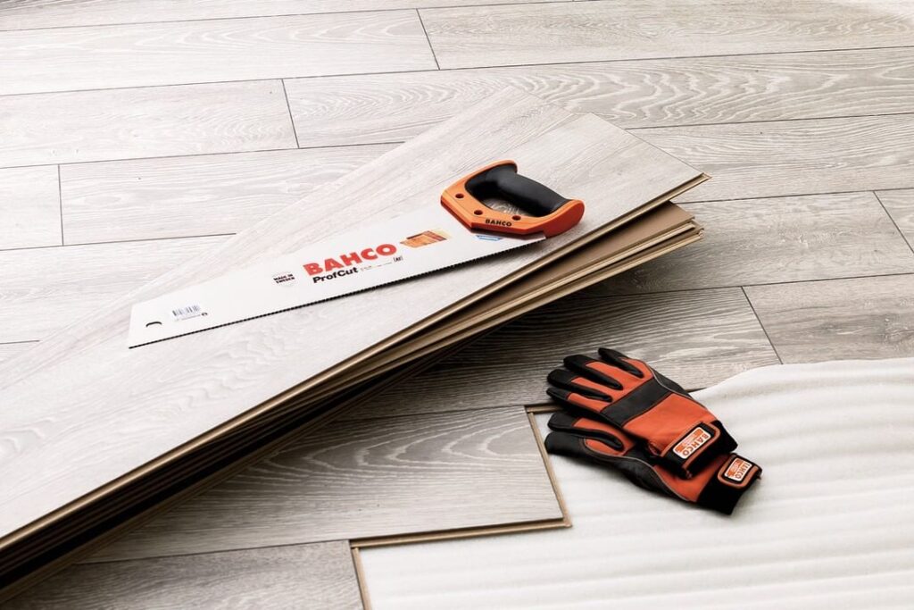 What tools do you need when cutting laminate flooring